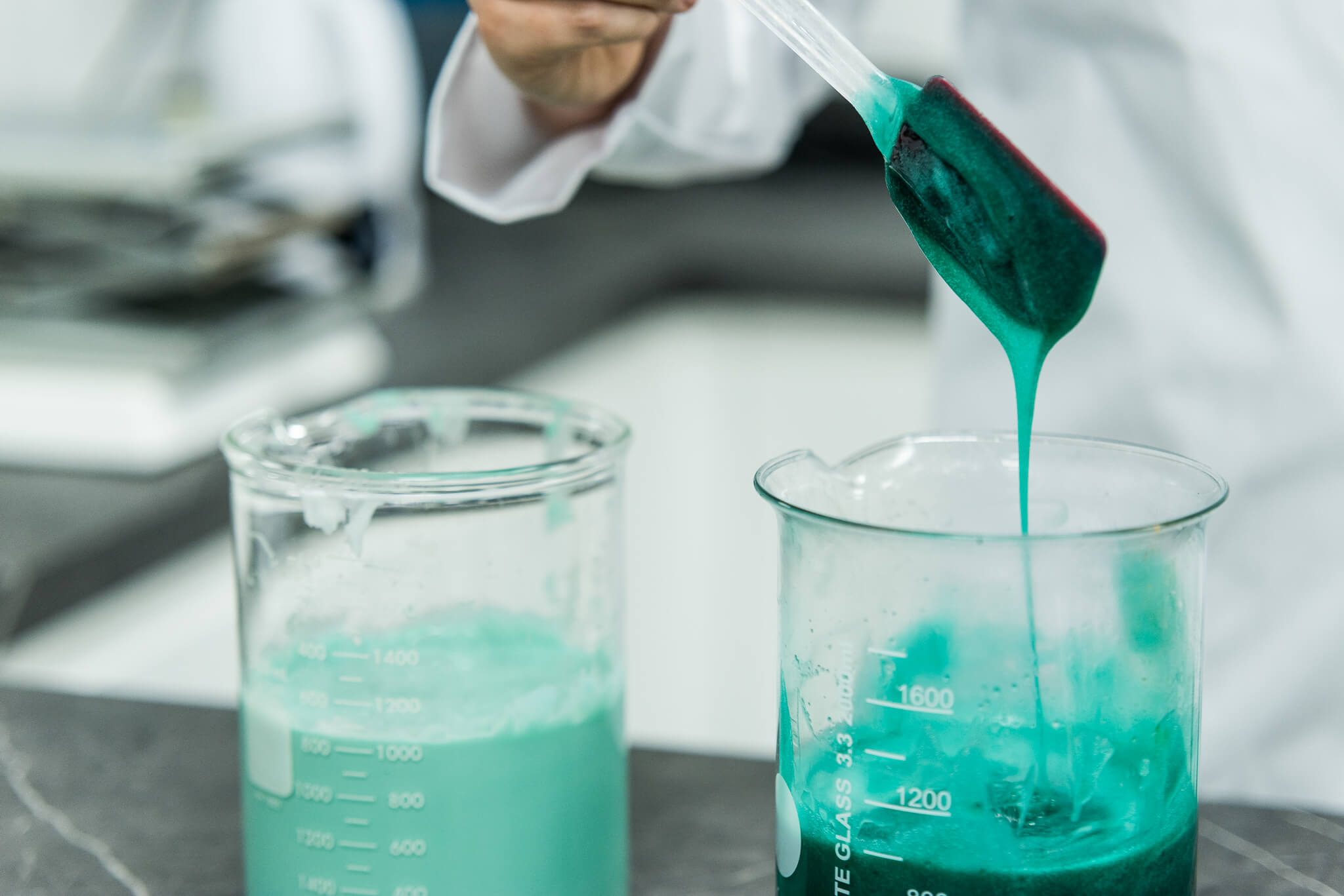 Chemist in a laboratory checking formulation of product